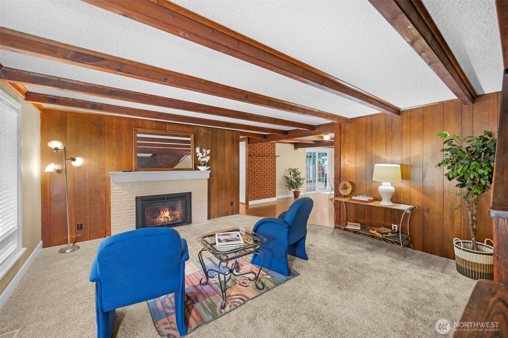 824 NE 194th Street, Shoreline, WA 98155 Living room with gas fireplace and beamed ceilings
