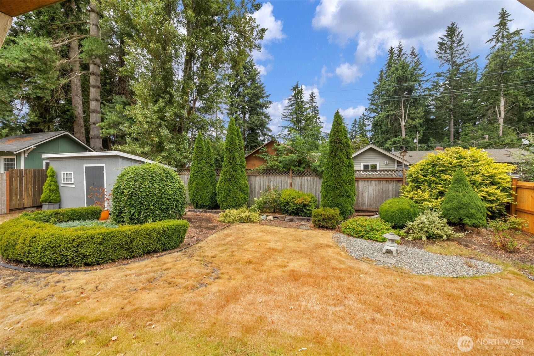 824 NE 194th Street, Shoreline, WA 98155 Beautifully landscaped back yard plus garden shed