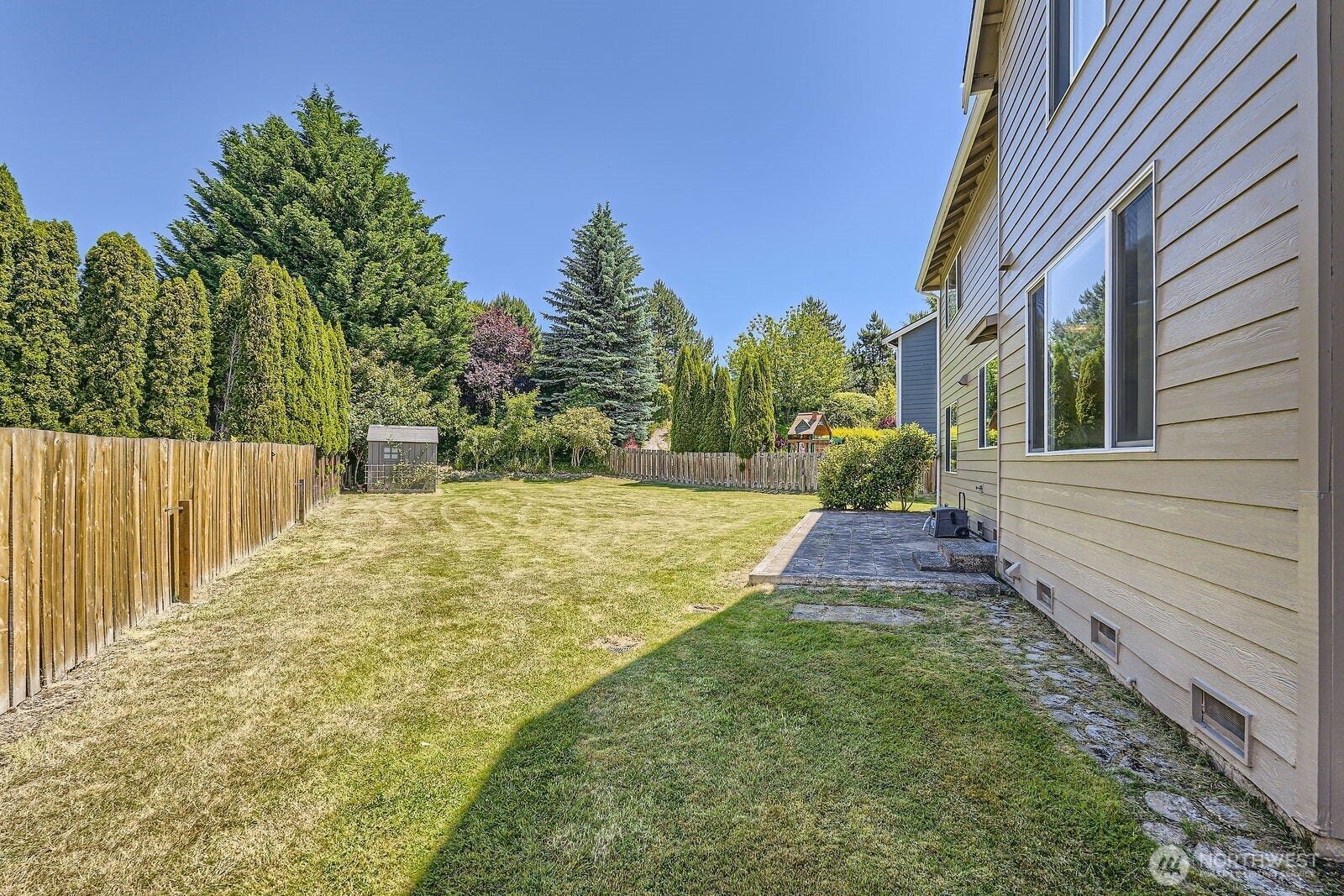 Massive fenced backyard