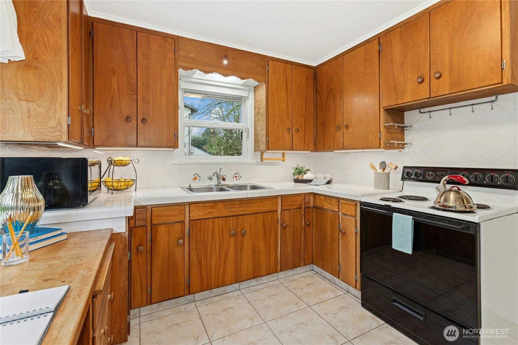 6526 NE 198th Street, Kenmore, WA 98028 Kitchen features ample natural light and cabinet space.