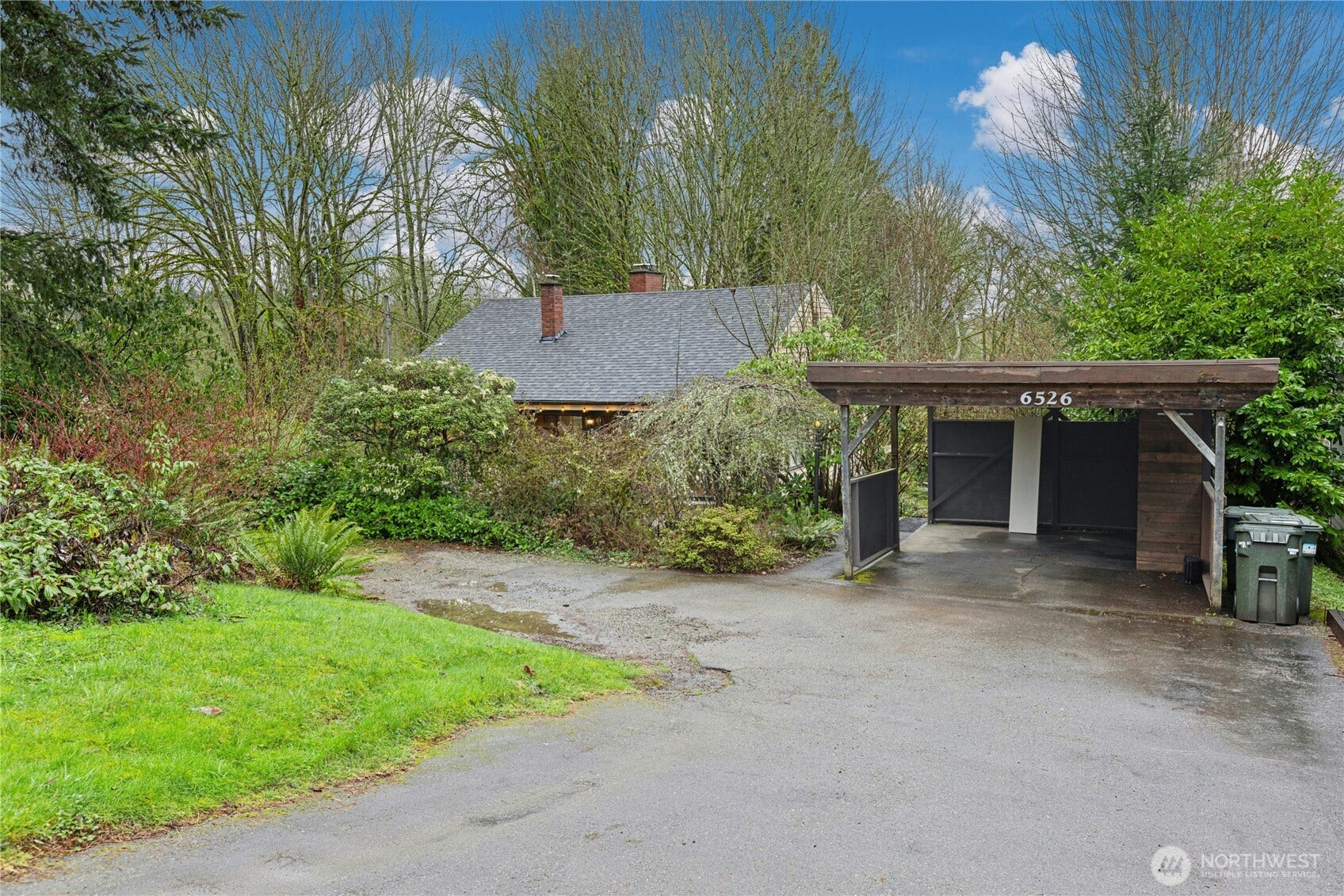 6526 NE 198th Street, Kenmore, WA 98028 Carport and long driveway with extra parking space.