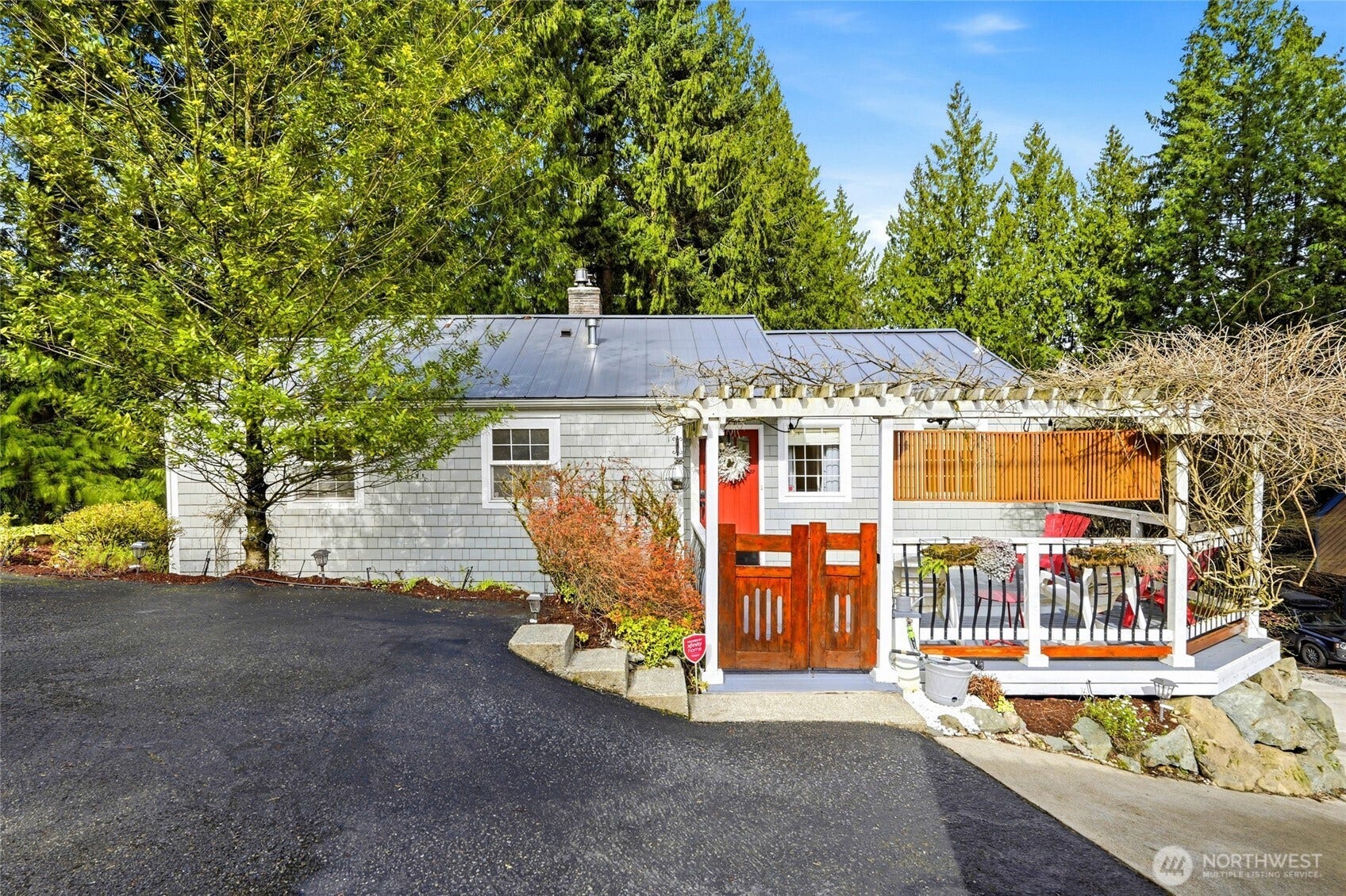 16714 SE Newport Way, Bellevue, WA 98006 Pic of the front of the home and home has two entrances. Property can be subdivided or build your own ADU or DADU! Come check it out today.