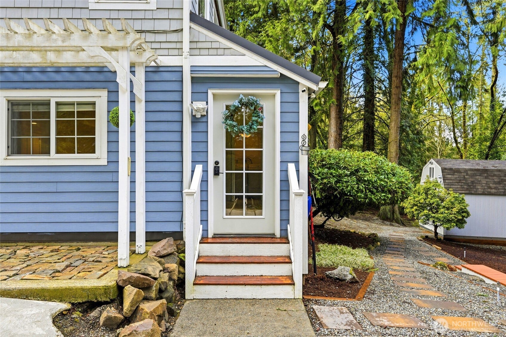 16714 SE Newport Way, Bellevue, WA 98006 Separate entrance from the side lower level to the sunroom leading to the family room.