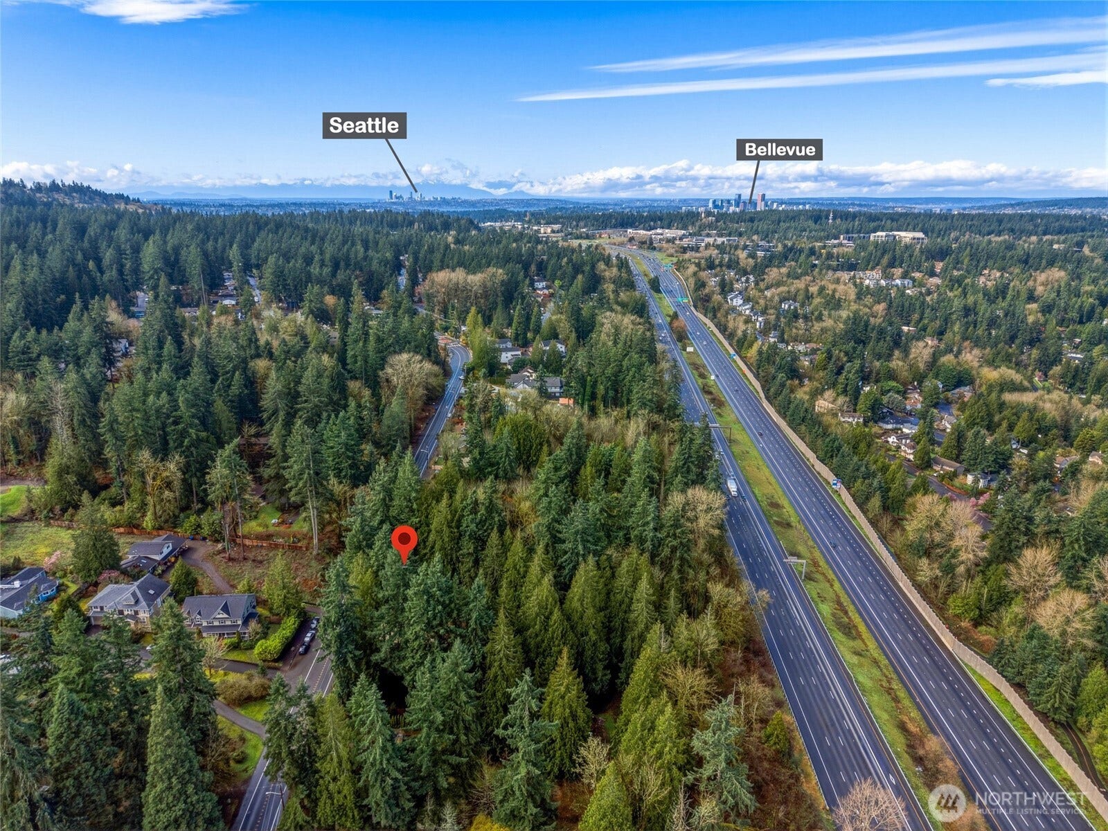 16714 SE Newport Way, Bellevue, WA 98006 Within minutes to main freeways and a privacy wall in works approved for additional peace of mind.