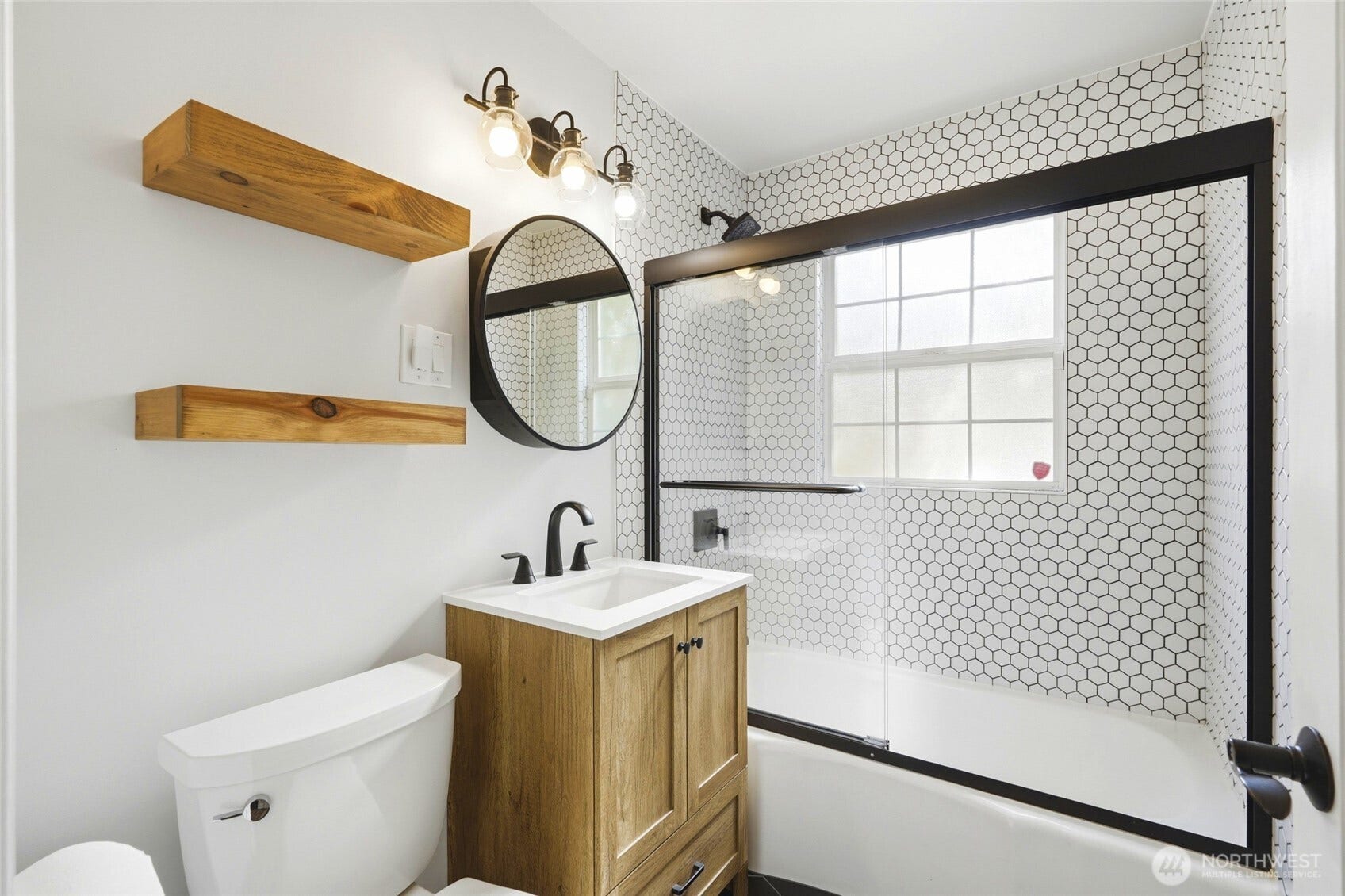 16714 SE Newport Way, Bellevue, WA 98006 Main Floor Bathroom Recently updated and nicely designed.