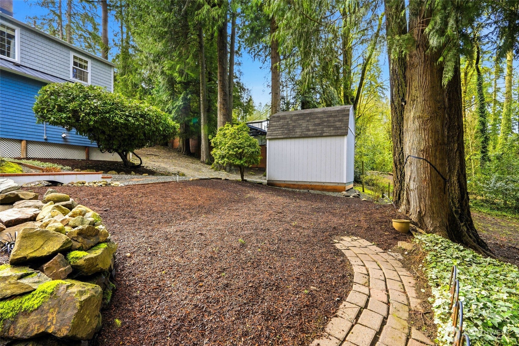 16714 SE Newport Way, Bellevue, WA 98006 Beautiful landscaped Backyard!