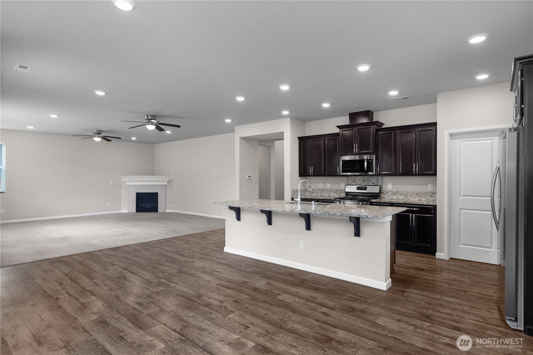 7040 Desperado Drive SE, Tumwater, WA 98501 View of family room and kitchen