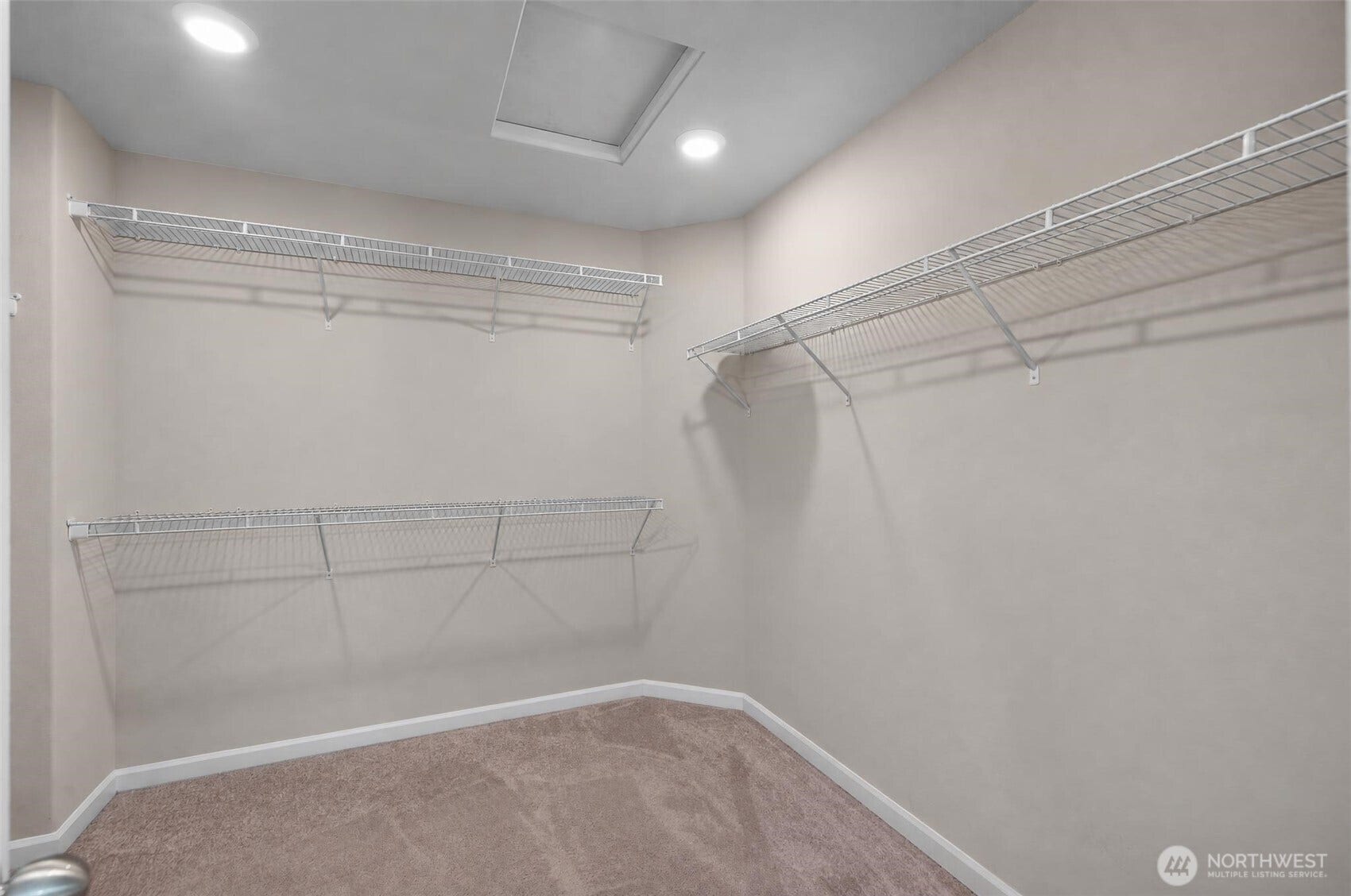 7040 Desperado Drive SE, Tumwater, WA 98501 Large primary bedroom walk-in closet.