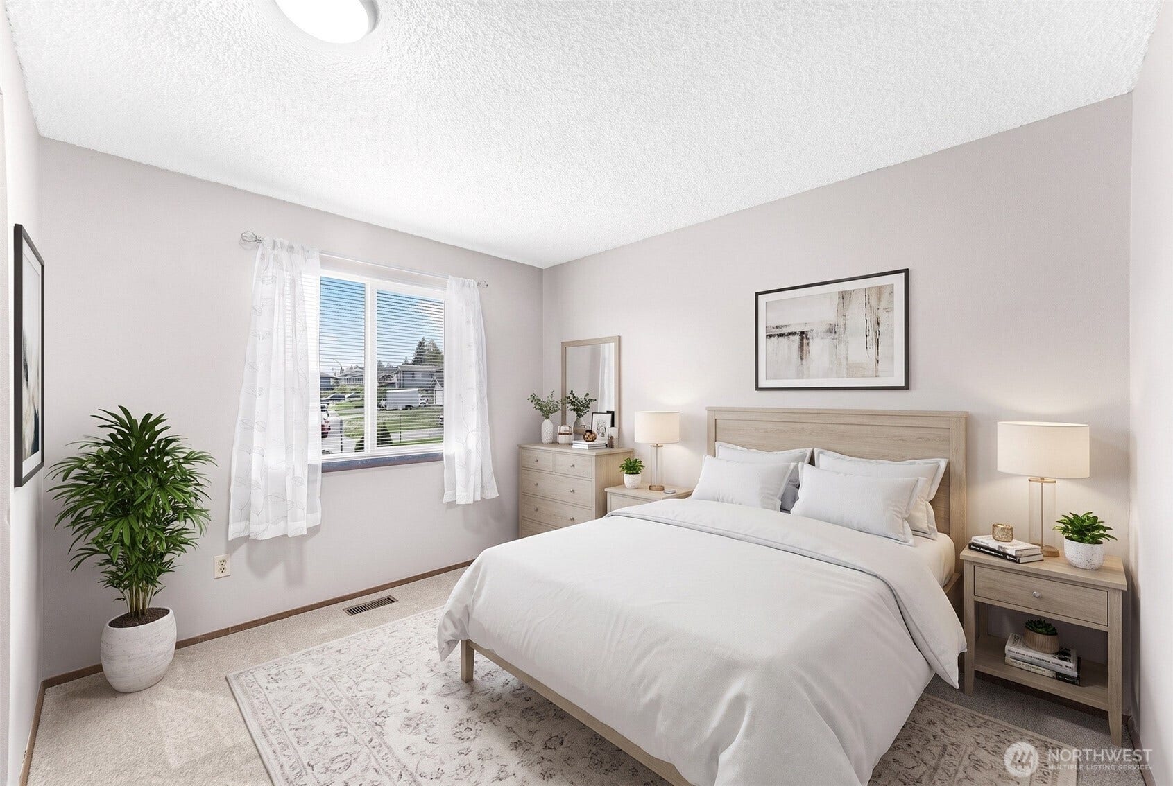 Bedroom 3 with front yard view. Virtually staged.
