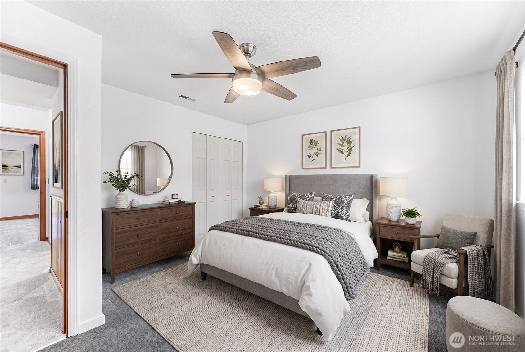 Spacious lower level bedroom. Virtually staged.