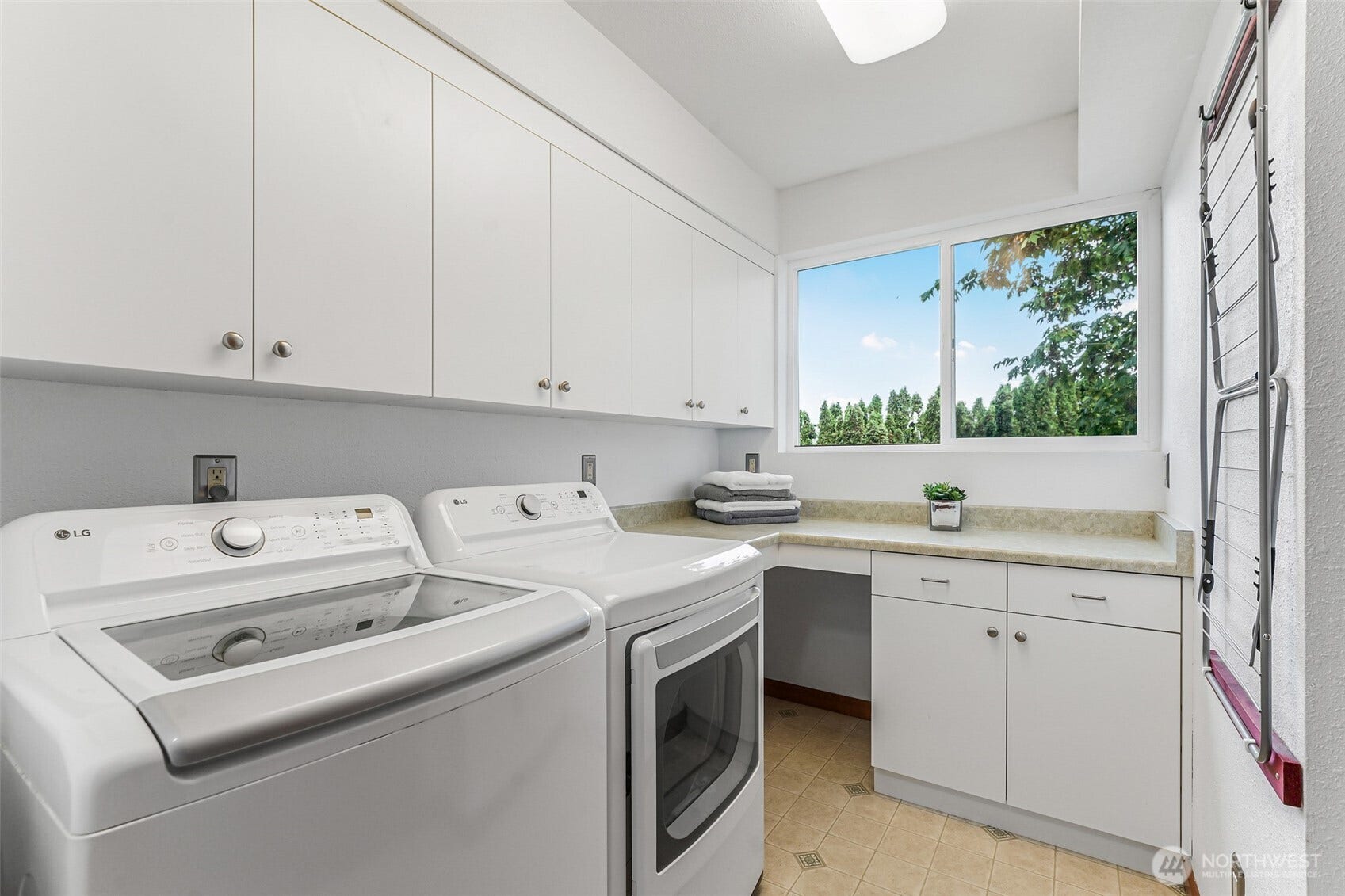 Plenty of cabinets, countertop space and newer washer and dryer.