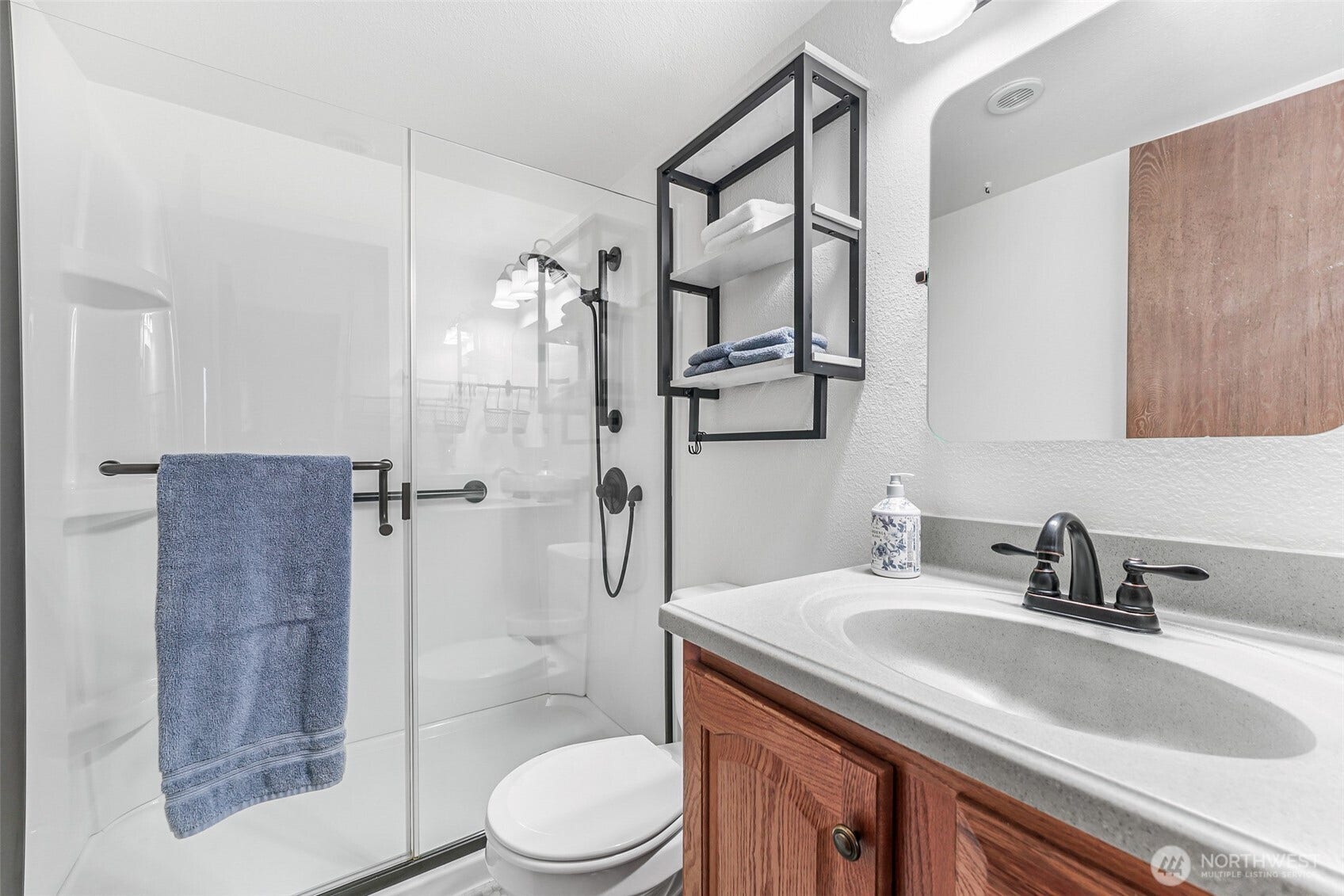 Primary bath with walk-in shower.