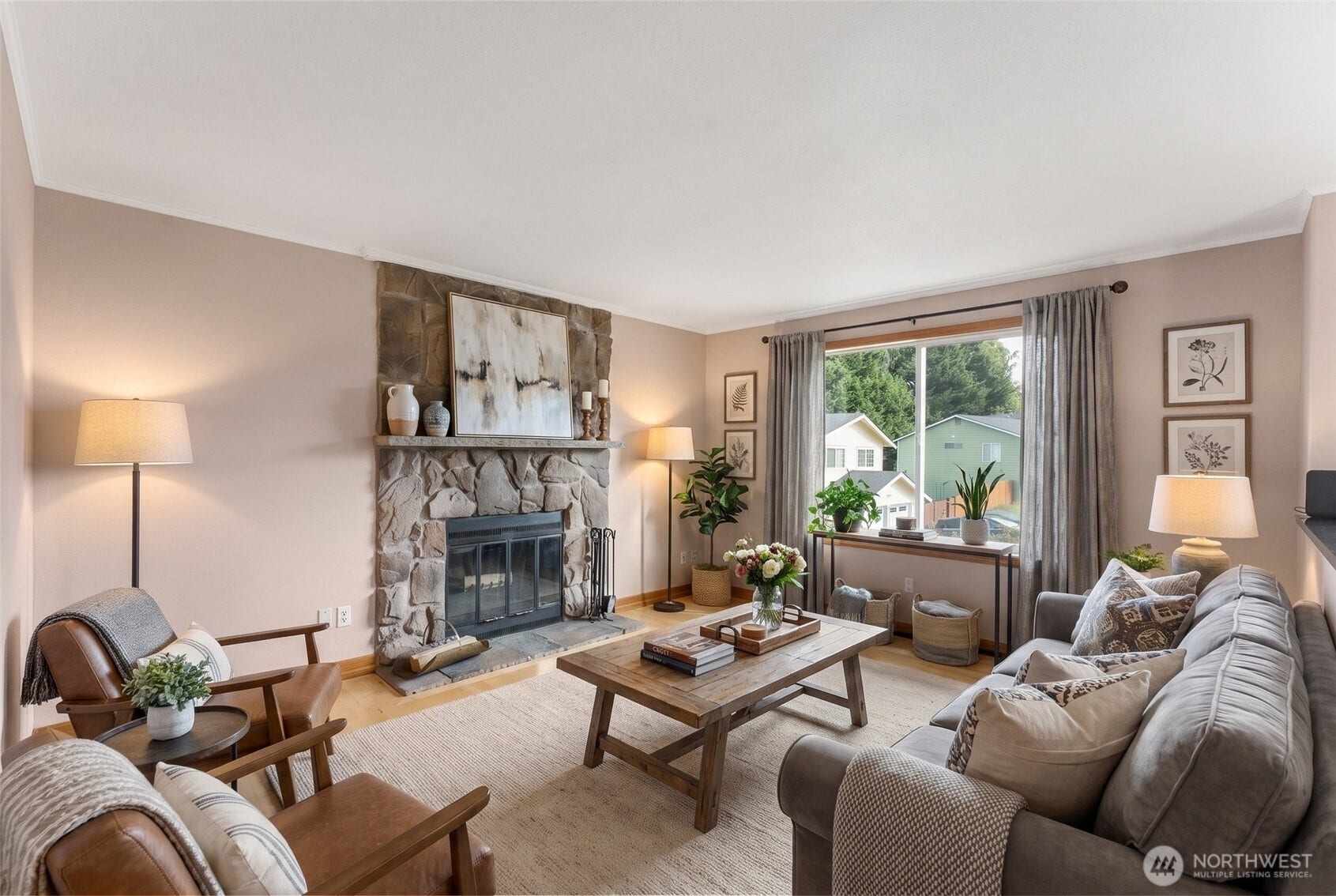 Cozy wood fireplace. Virtually staged.