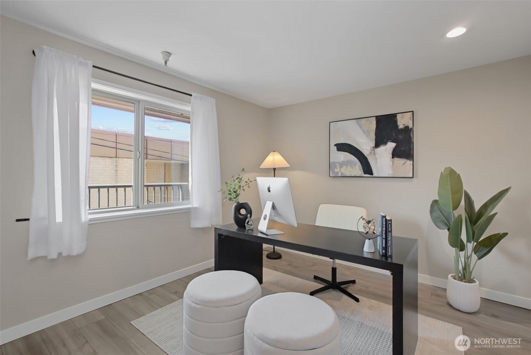 Versatile second bedroom has a west-facing window and spacious closet