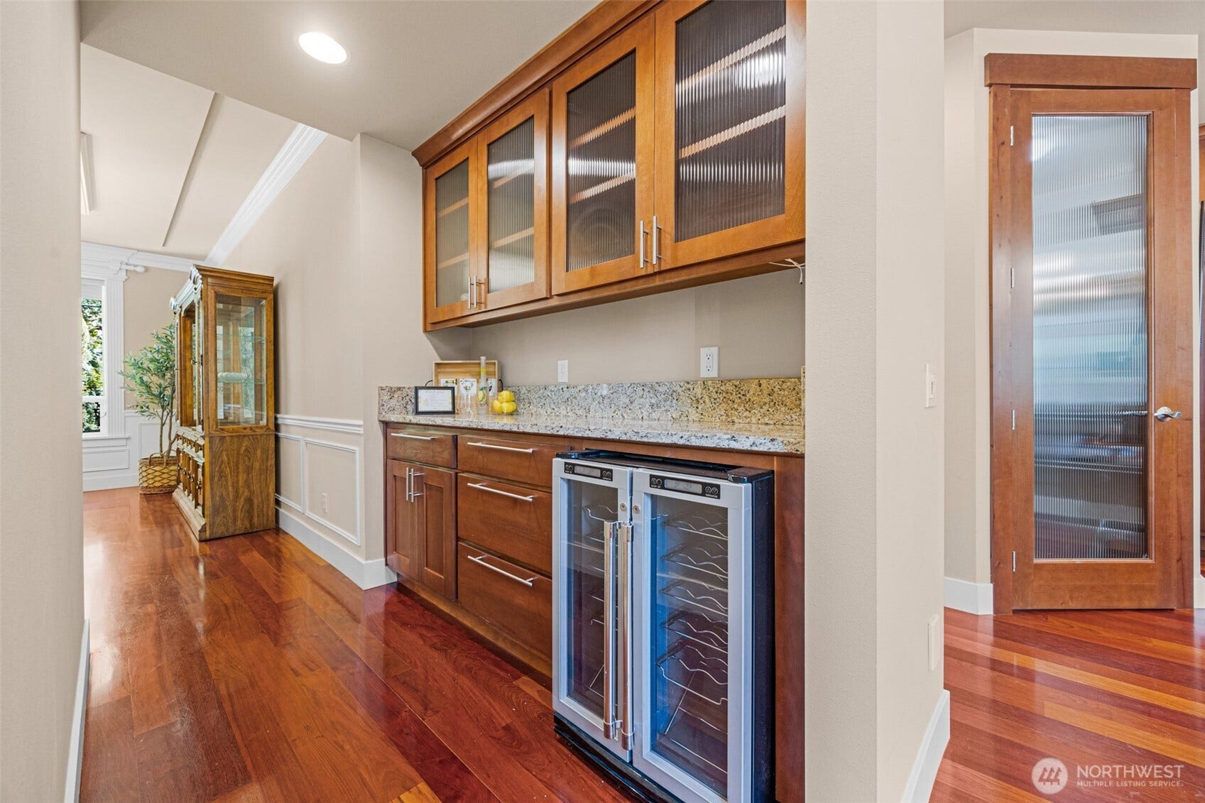 Butler's pantry with beverage refrigerator.