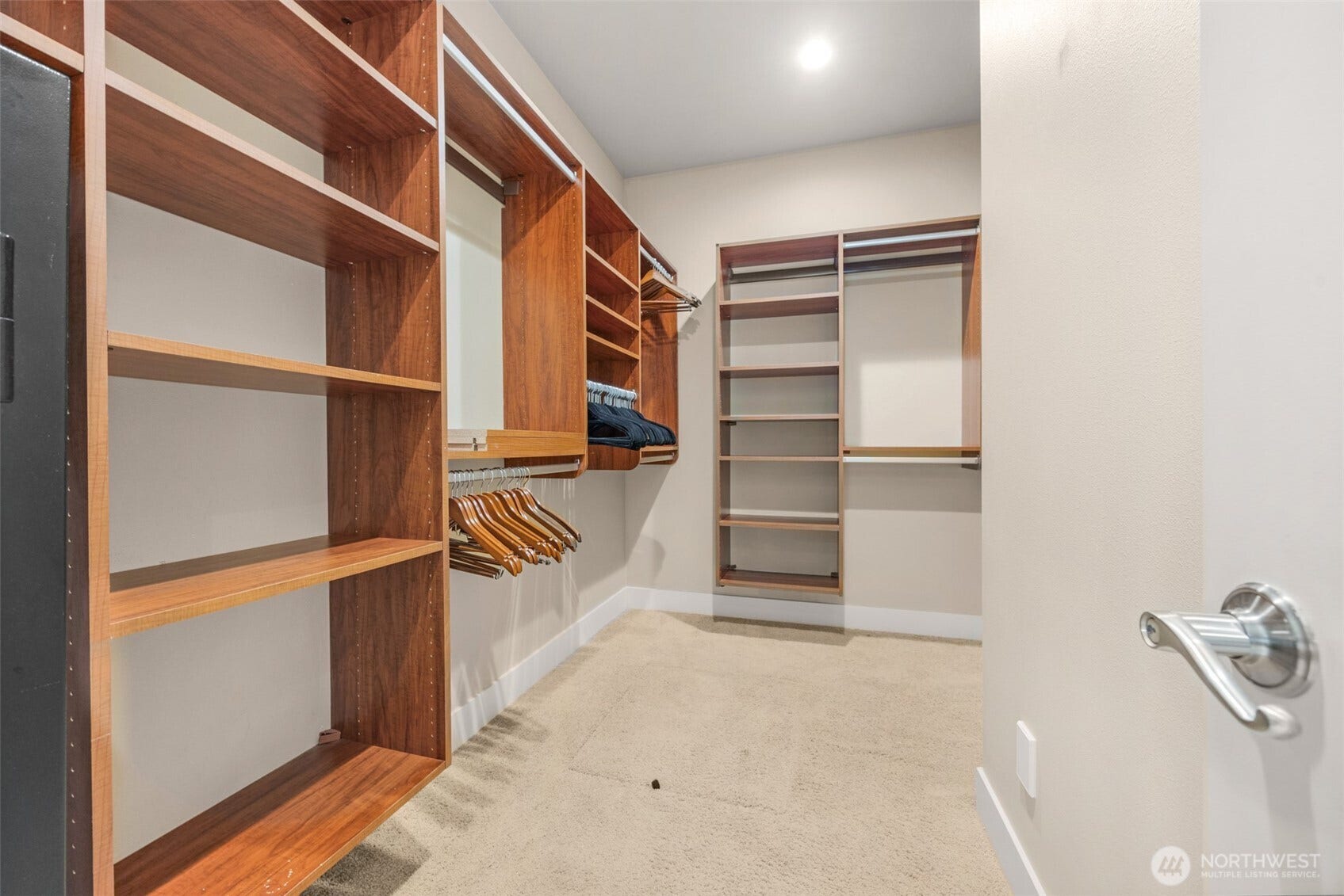 Primary suite walk-in closet.