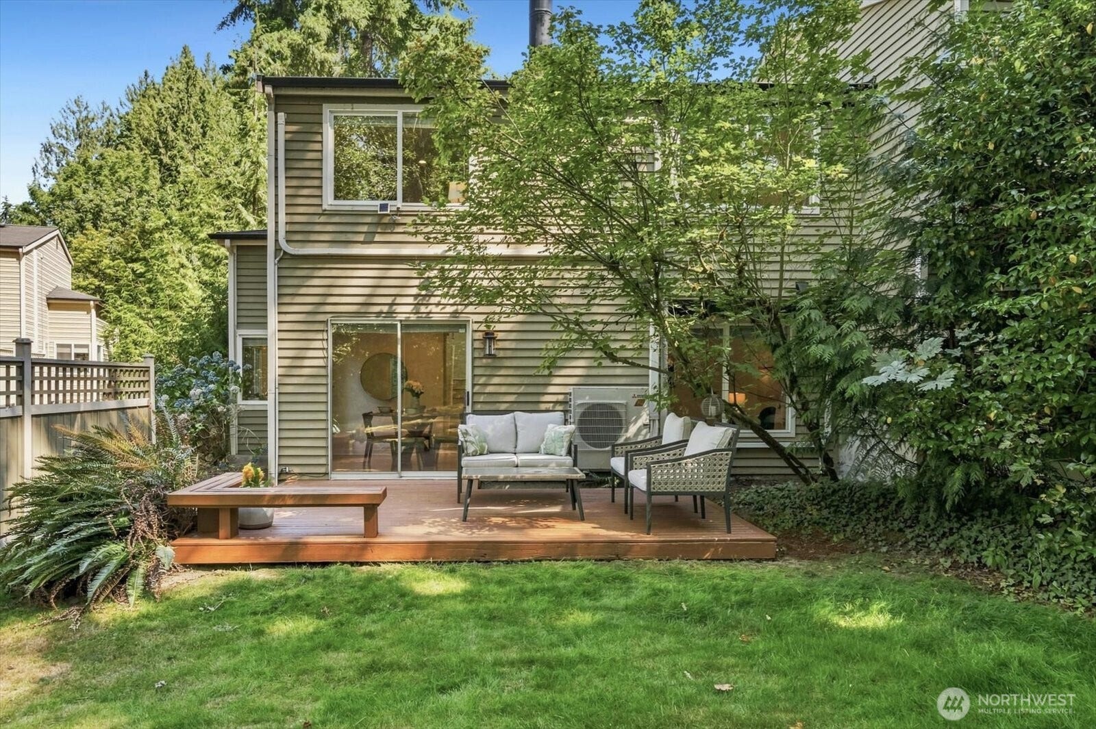 11411 102nd Court NE, Kirkland, WA 98033 Mature trees and greenery surround the home, offering a private, sanctuary feel! An added bonus to have nature at your doorstep, and being so close to Juanita, the lake, and shopping/dining!