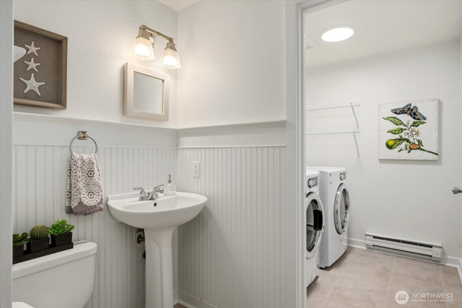 11411 102nd Court NE, Kirkland, WA 98033 Updated main-level powder room adds convenience for guests.