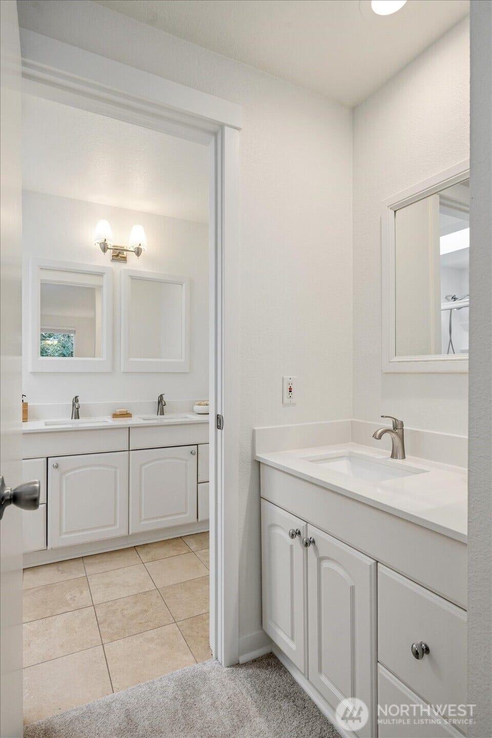 11411 102nd Court NE, Kirkland, WA 98033 The primary suite includes its own private vanity, just steps from the full bath.