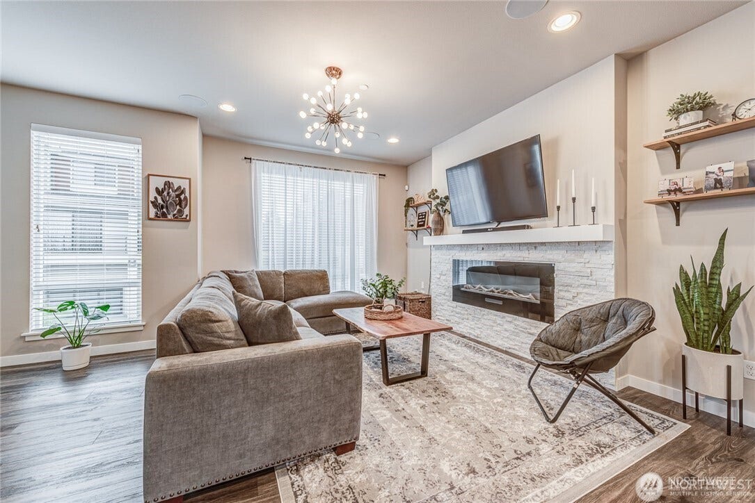 Living Room with gas log fireplace.