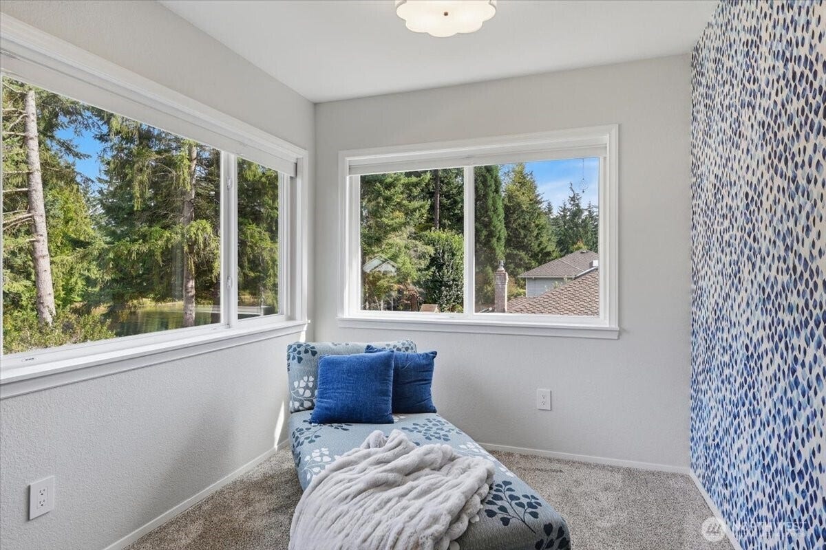 3623 125th Place SE, Everett, WA 98208 Sitting room offers a peek a boo view of one of the many neighborhood ponds.