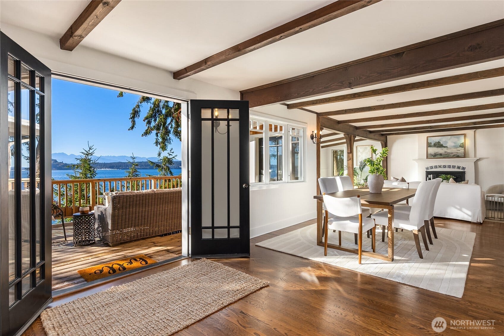 8405 Hansen Road NE, Bainbridge Island, WA 98110 The main floor has comfortable spaces that flow easily to the expansive decks.
