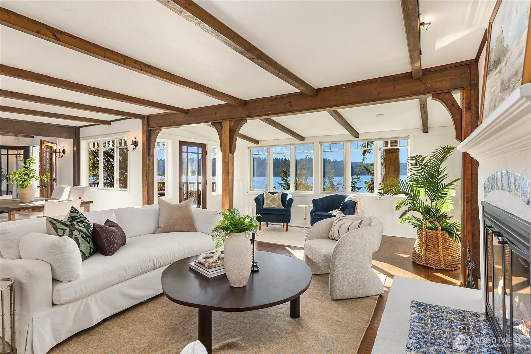 8405 Hansen Road NE, Bainbridge Island, WA 98110 Warmth exudes from the living room to the sun room.