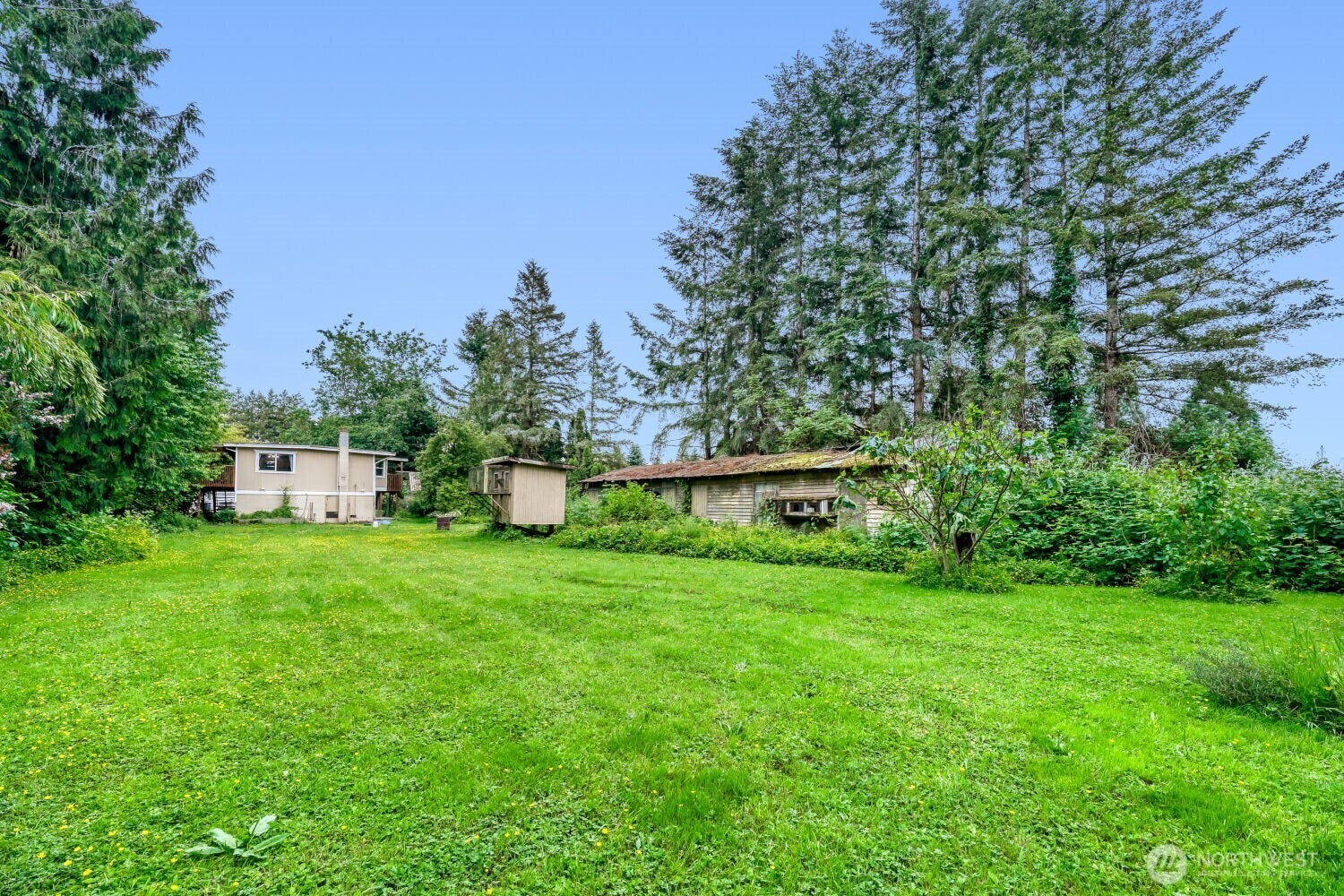 Over 1 Acre of level property.