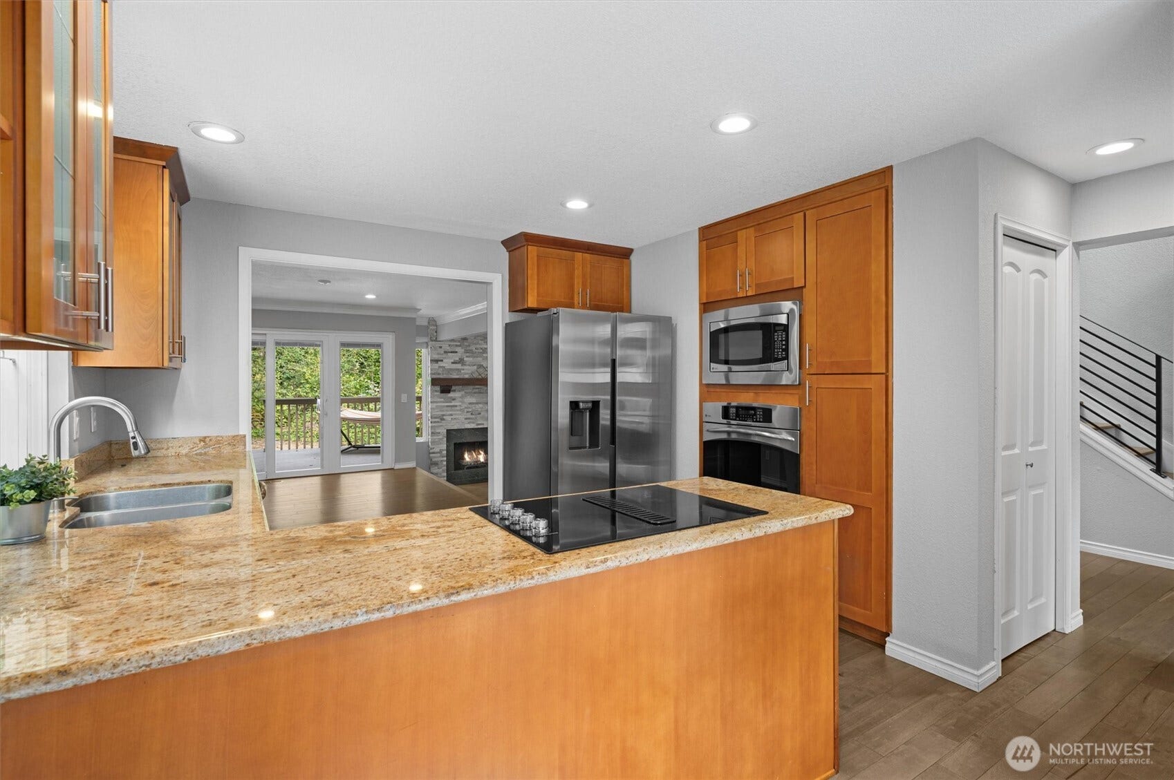 Kitchen with refrigerator purchased in 2025.