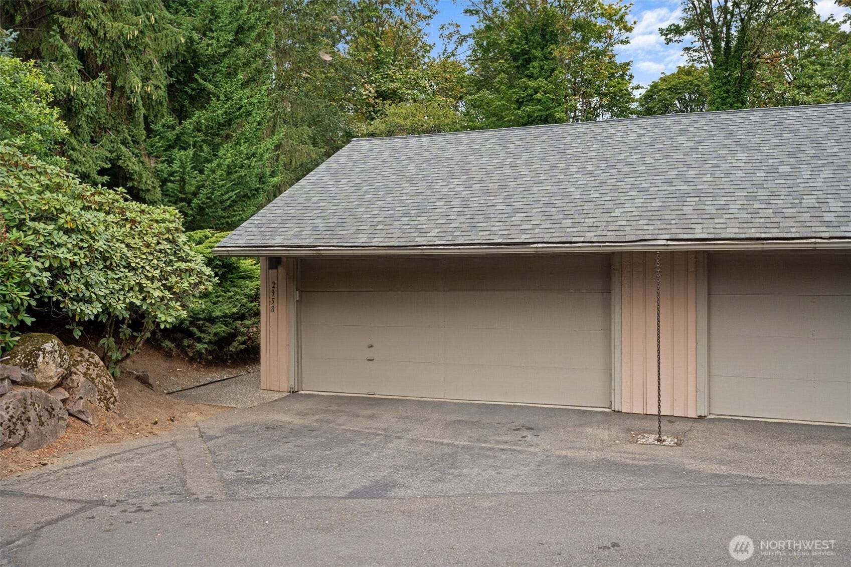 2 Car Garage that can fit large SUV or truck, plenty of storage space.