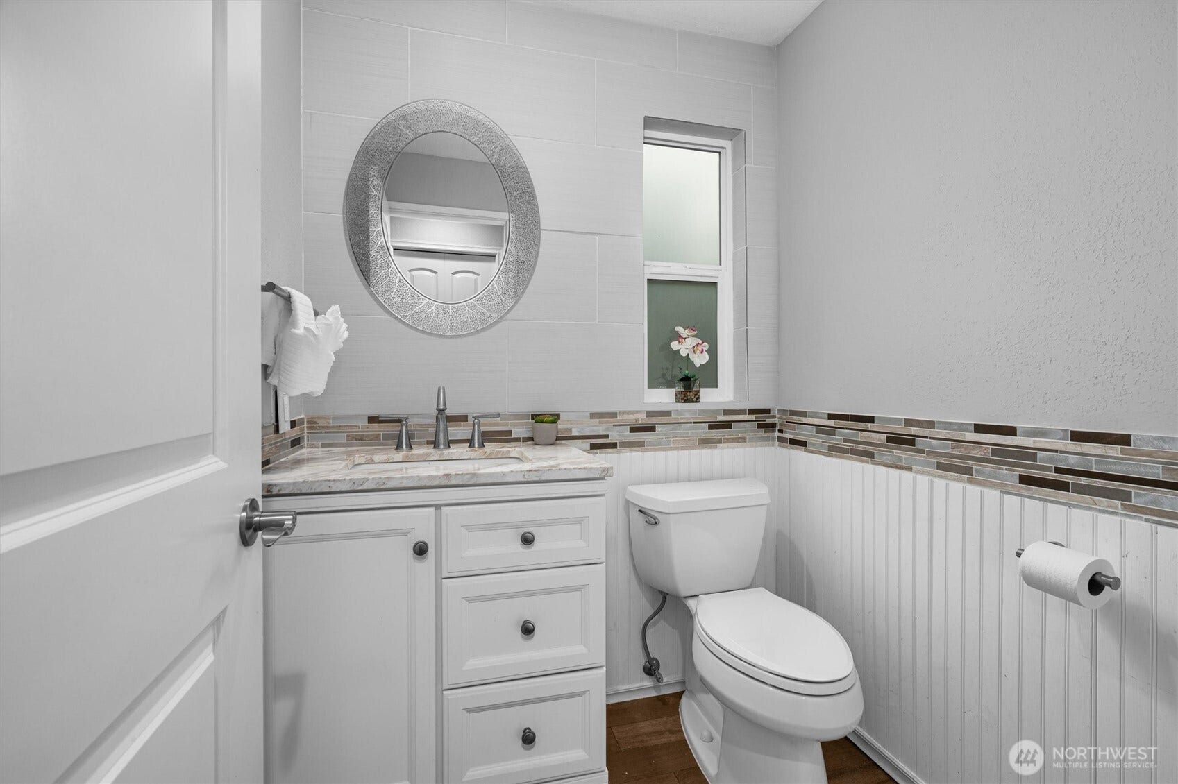 Lower level half bathroom.