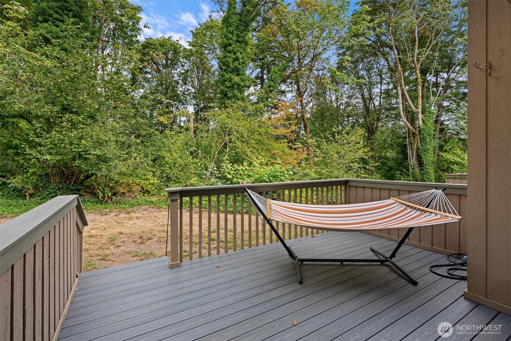 Brand new composite decking installed in 2025. Peaceful greenbelt with frequent wildlife spottings. End unit feels secluded and private.