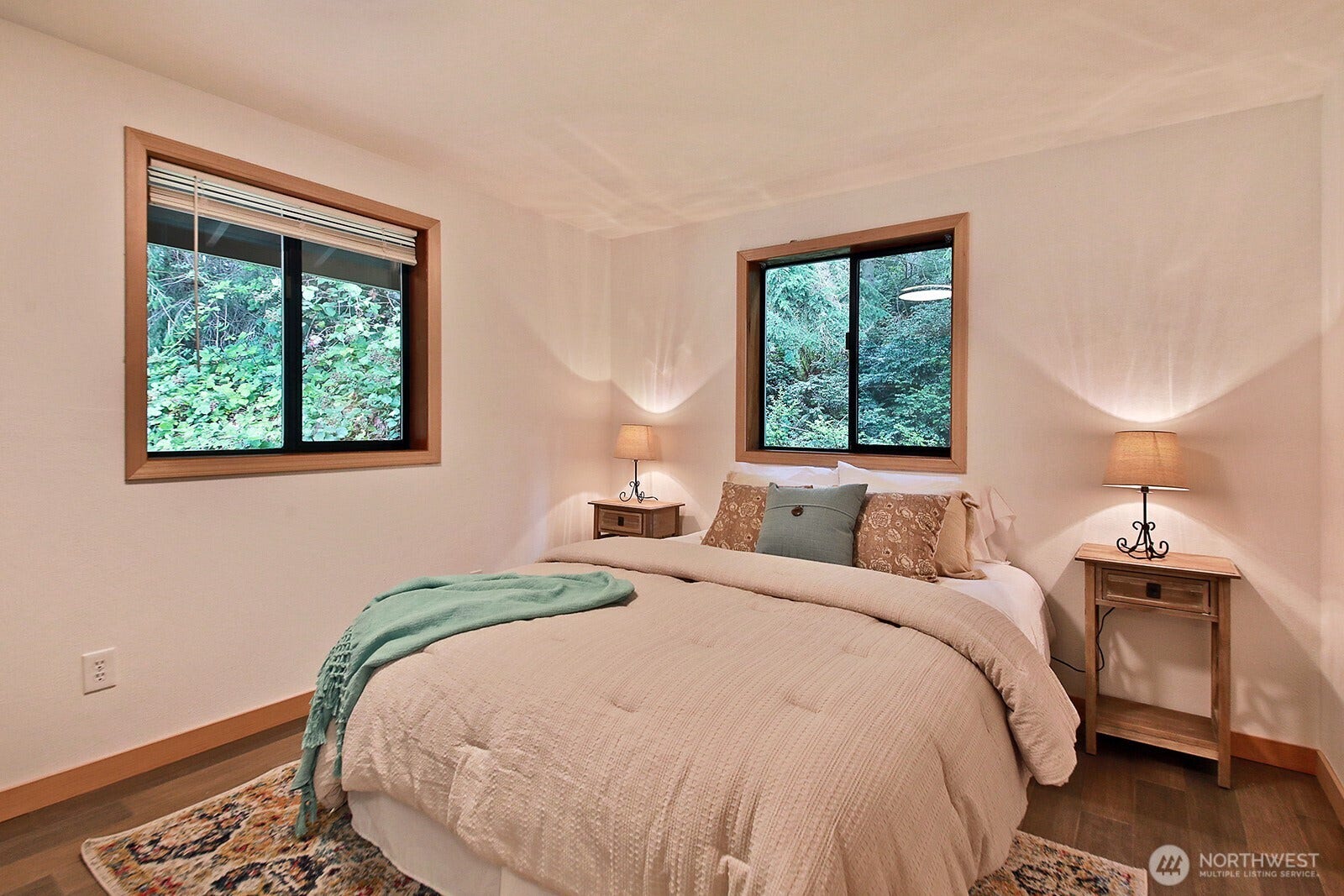 This is the smaller bedroom on the main level and is located across from the main level bathroom.