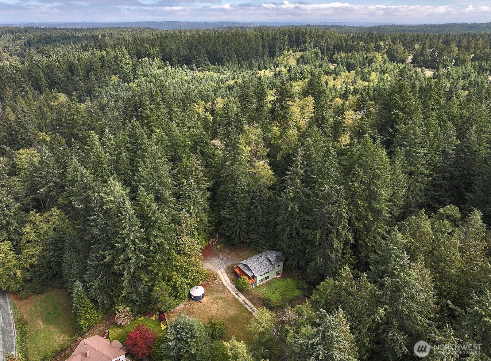 What the local eagles and owls see and good perspective on the natural boundary of forest that creates privacy and beauty.