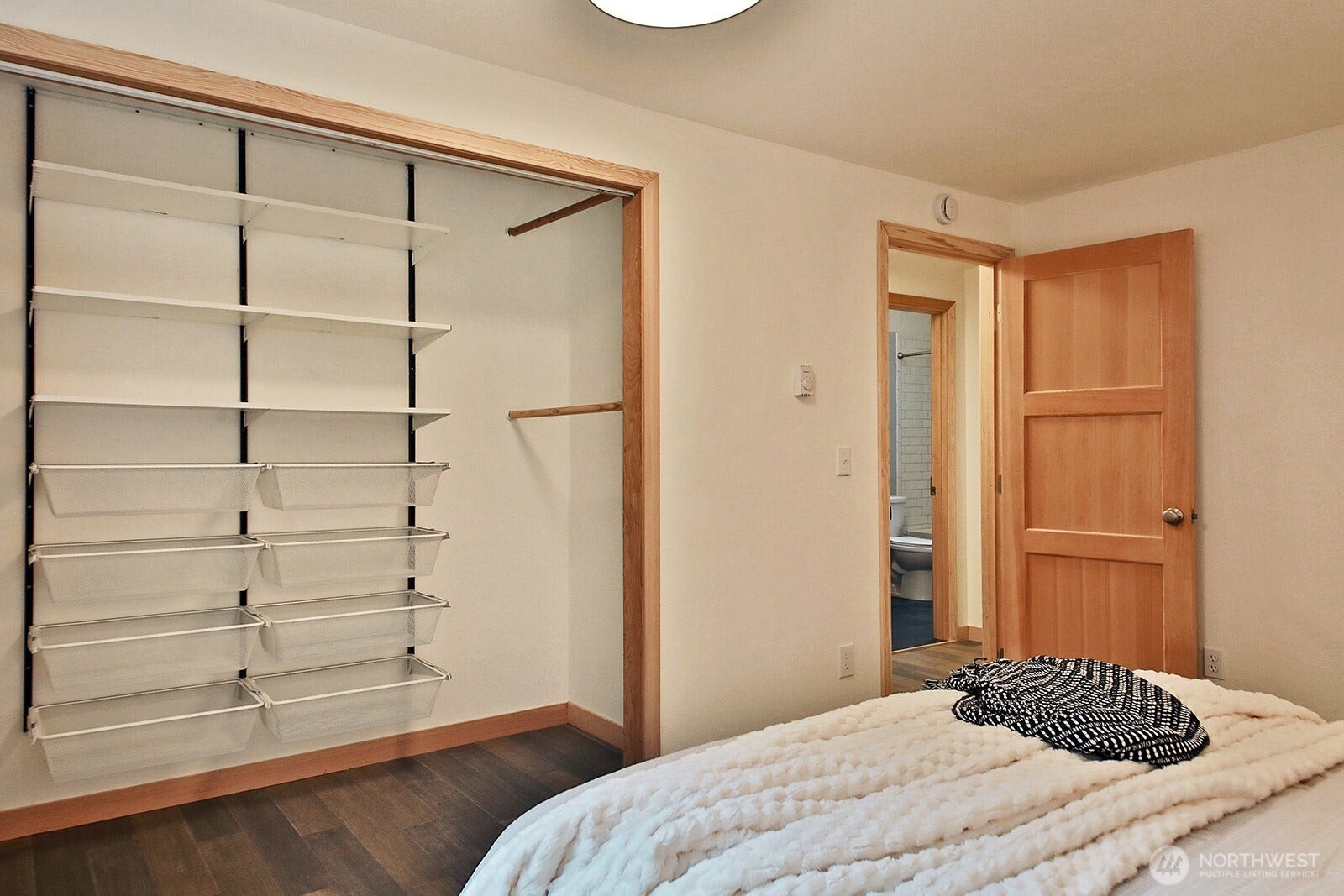 All of the bedroom closets have built in storage and all of the doors are solid wood.