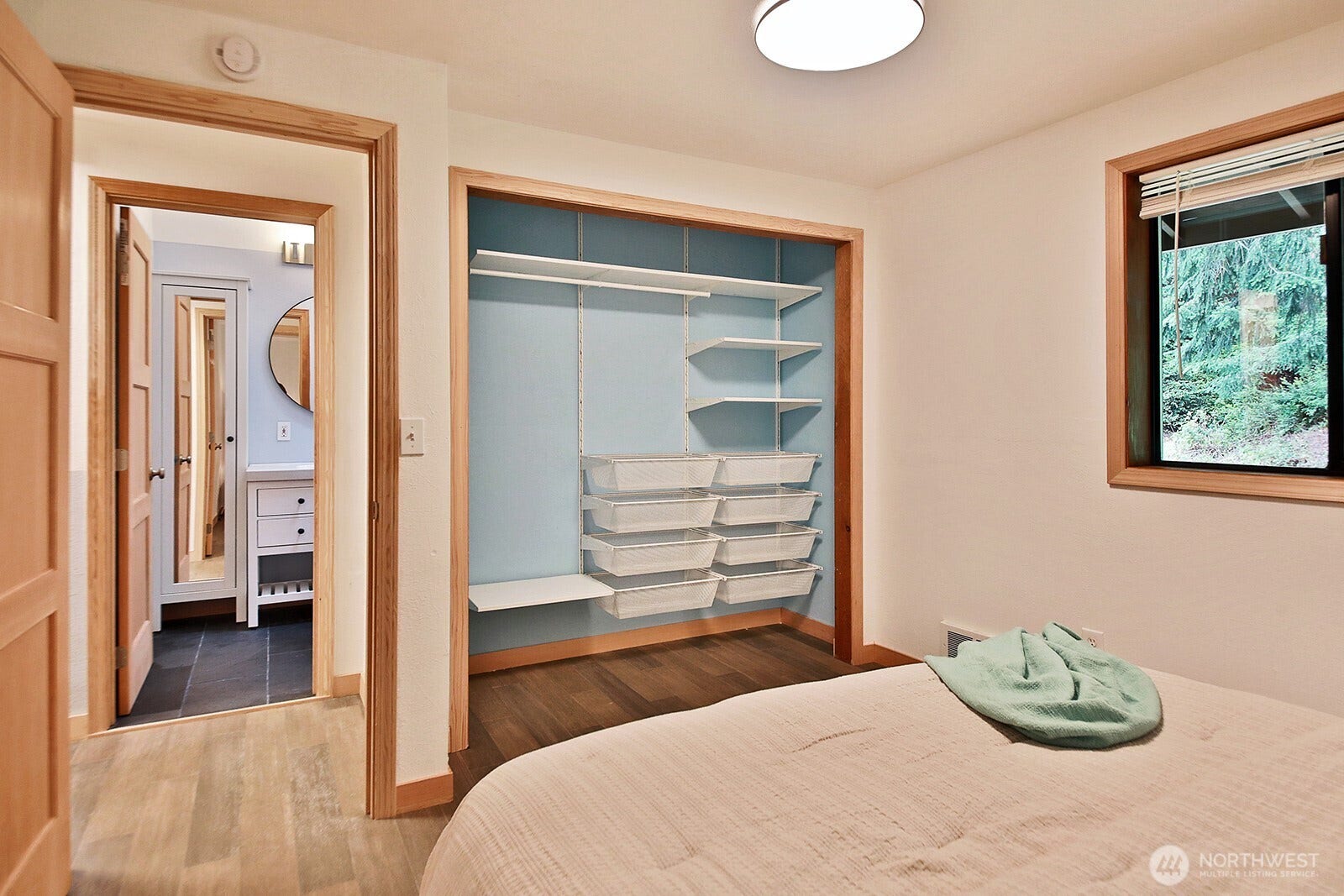 Another view of this bedroom with a glimps of the full bath through the open door. Let's go downstairs.....