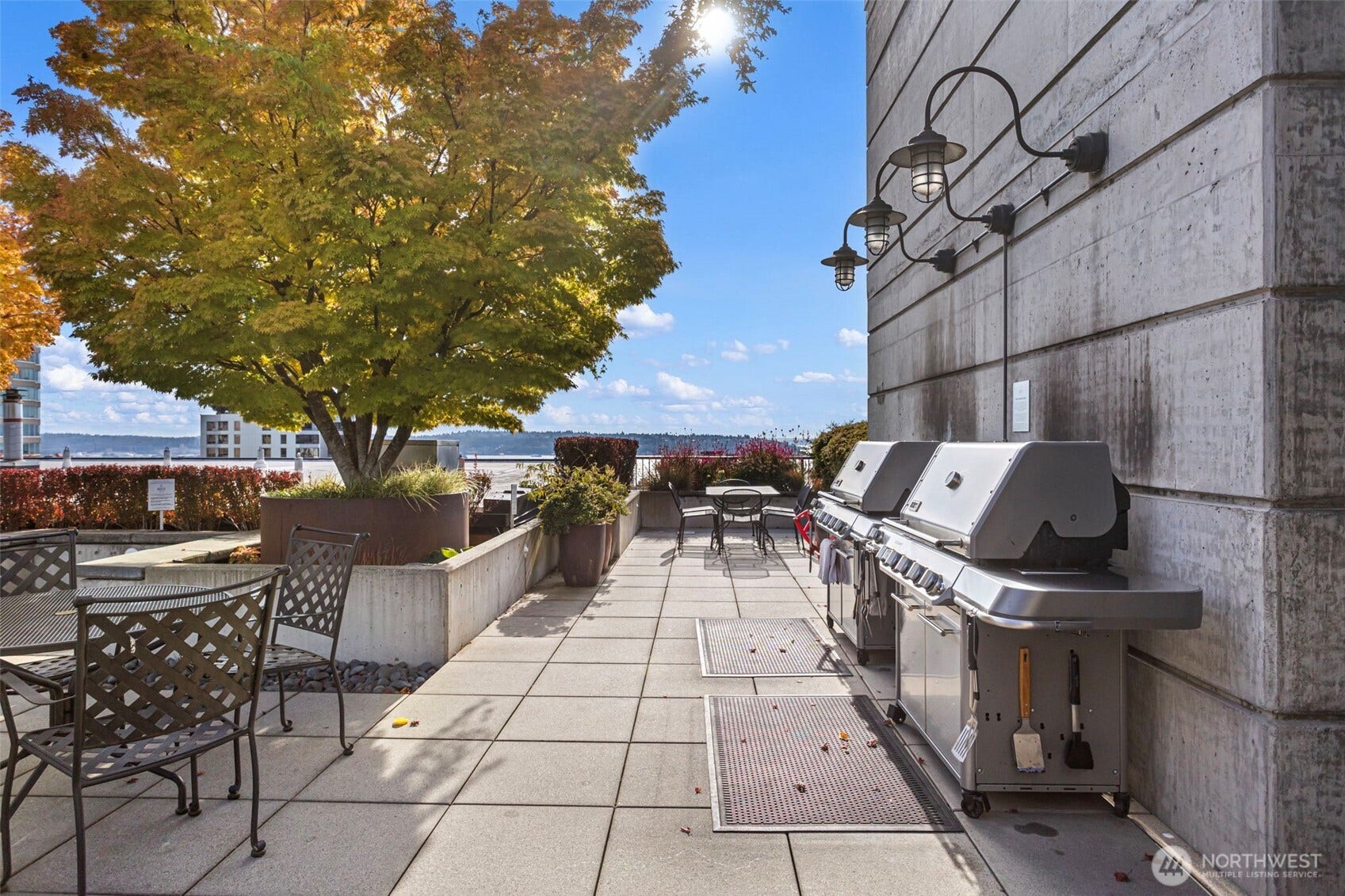 Grills on rooftop deck.