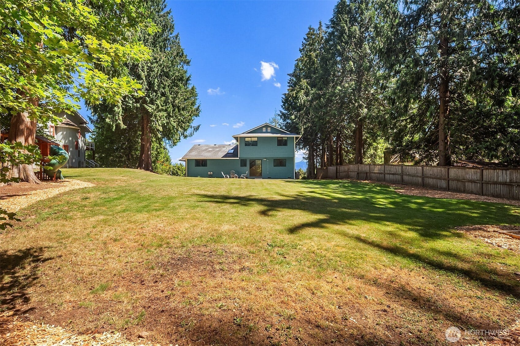 1247 293rd Avenue NE, Carnation, WA 98014 Prior to septic replacement. You will love the spacious backyard.