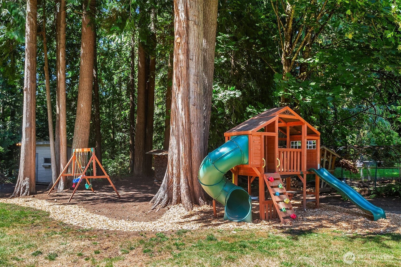 1247 293rd Avenue NE, Carnation, WA 98014 There is a play structure and swing set to enjoy.