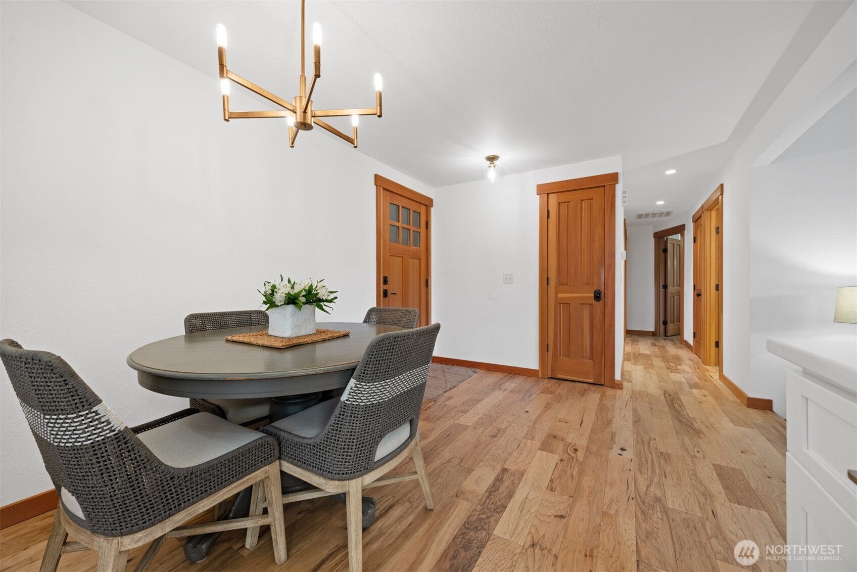 3793 Greenville Place, Bellingham, WA 98226 The dining area is open to the living room and kitchen and the home has engineered hardwood flooring with carpet only in the two bedrooms.