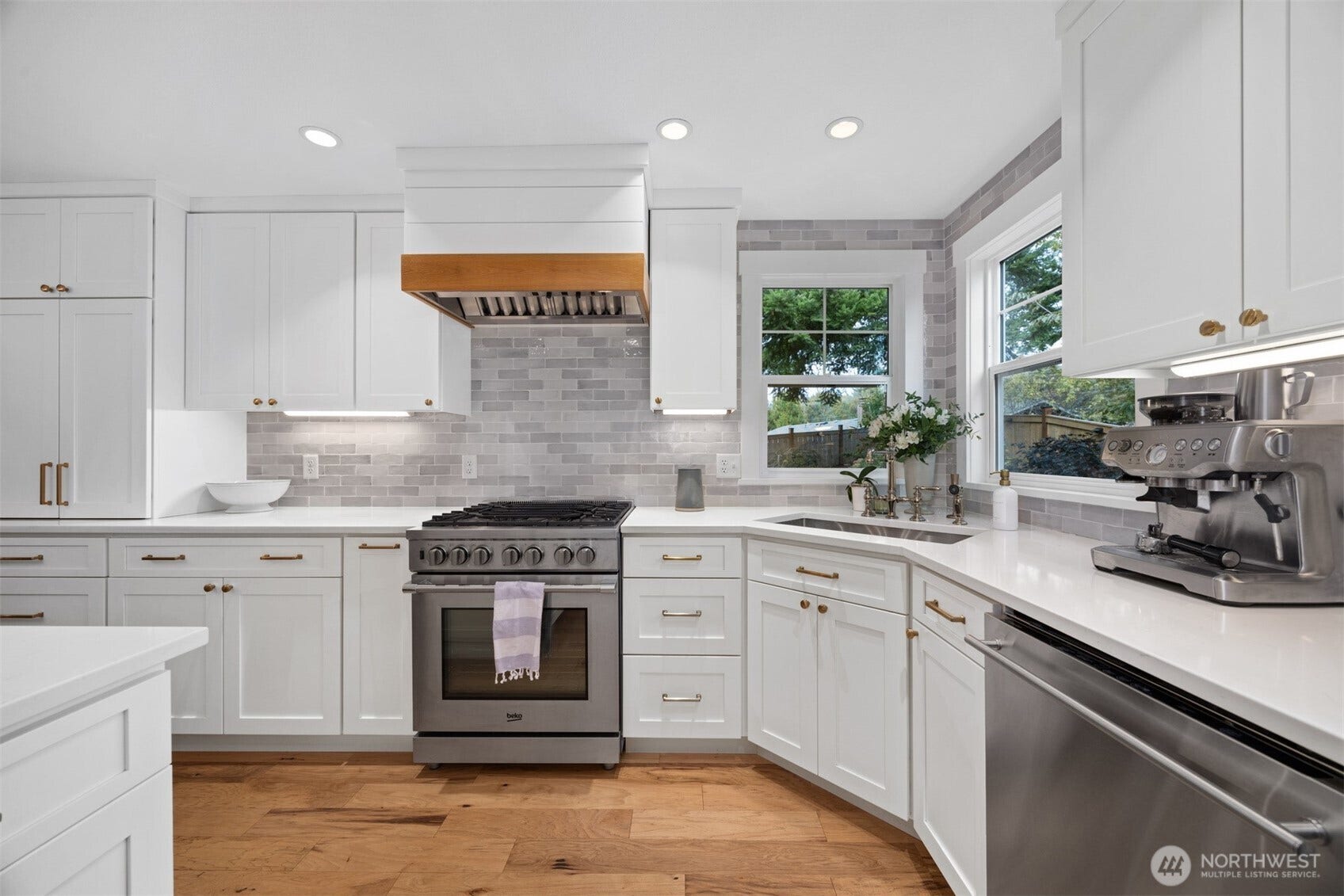 3793 Greenville Place, Bellingham, WA 98226 This kitchen is amazing with the tile backsplash that accents the quartz counter tops.