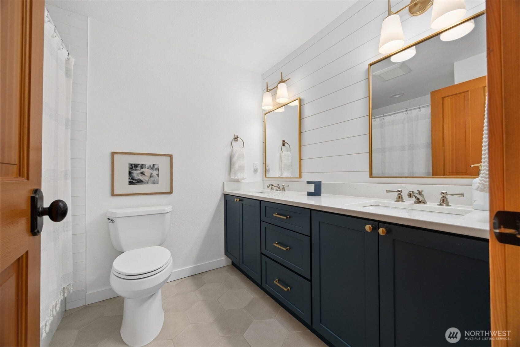 3793 Greenville Place, Bellingham, WA 98226 The full bath is just across the hall from the 2nd and 3rd bedroom and has a beautiful new dual sink vanity and tile floor.