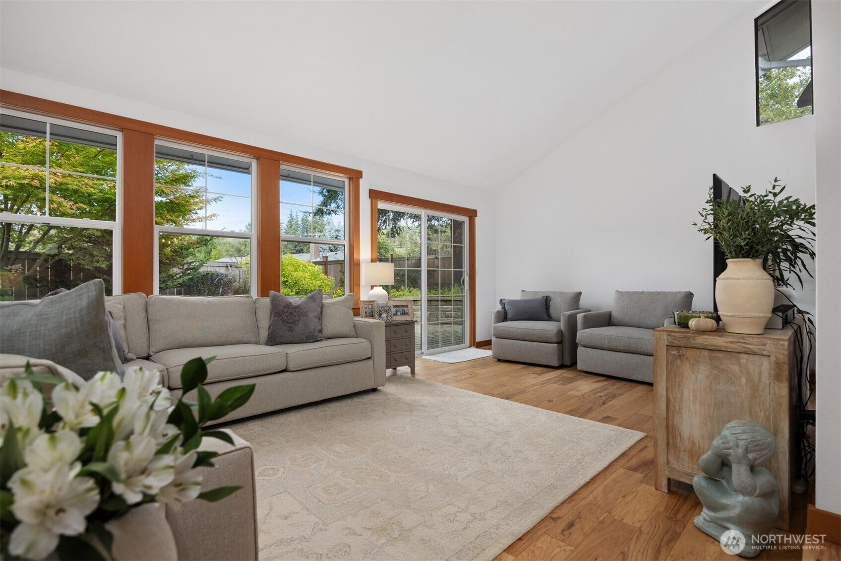 3793 Greenville Place, Bellingham, WA 98226 The living room is very spacious and has a wall of windows looking to the incredible rear yard and landscape.