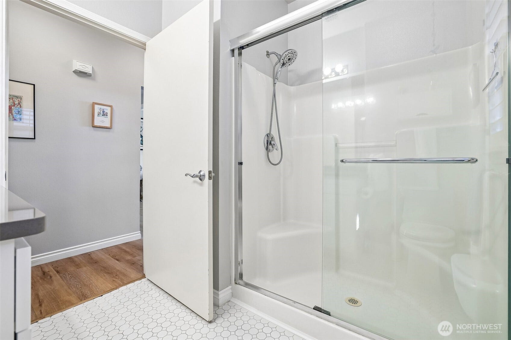 22475 SE 38th Terrace, #1418, Issaquah, WA 98029 Step in shower with glass enclosure for ease of use.