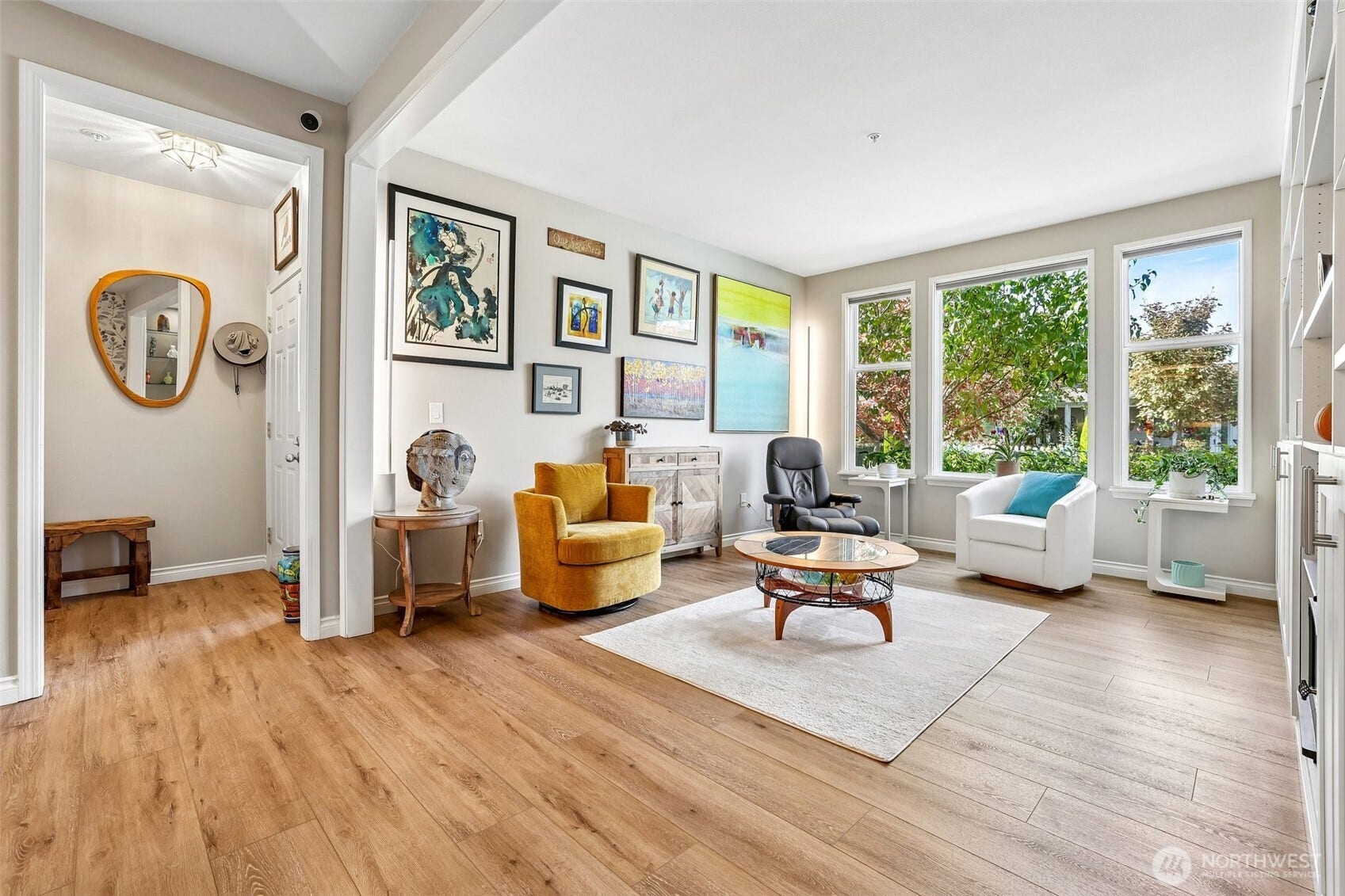 22475 SE 38th Terrace, #1418, Issaquah, WA 98029 front entry opens to 9 foot ceilings, new flooring, open layout.