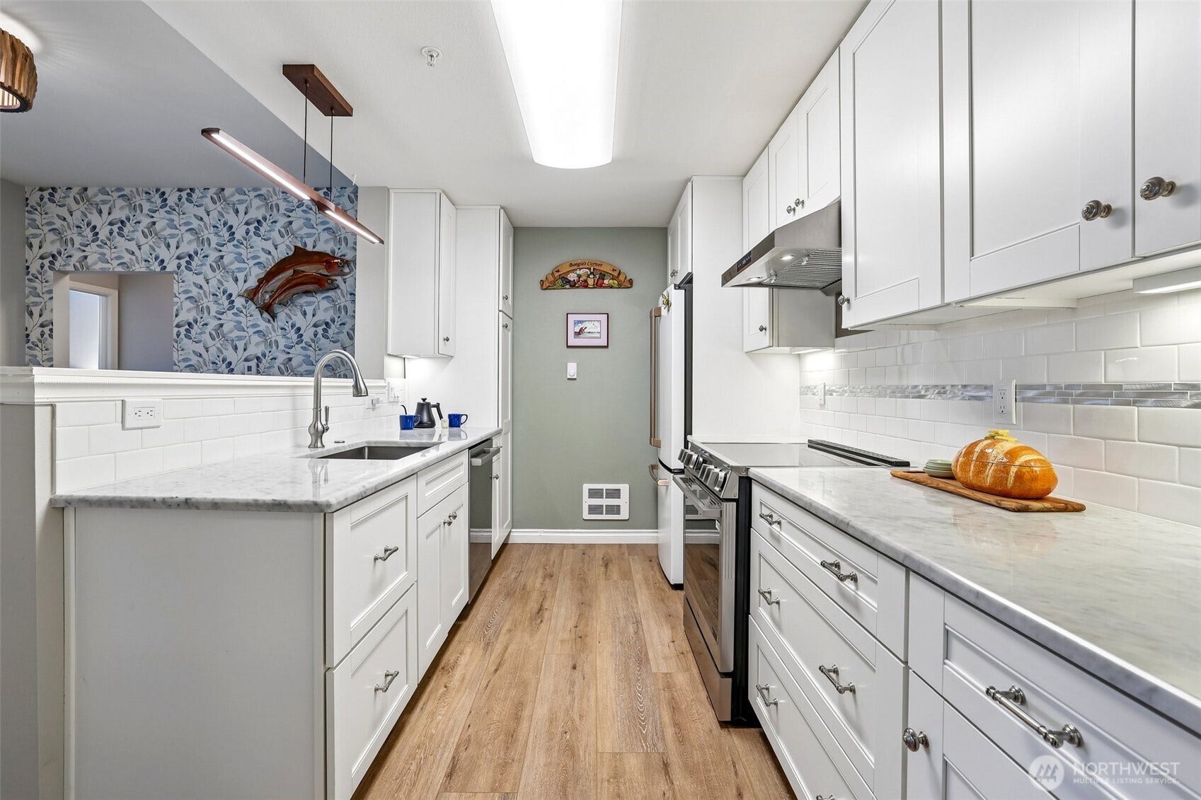 22475 SE 38th Terrace, #1418, Issaquah, WA 98029 3 layers of lighting - ceiling, undercabinet & designer light over the sink.
