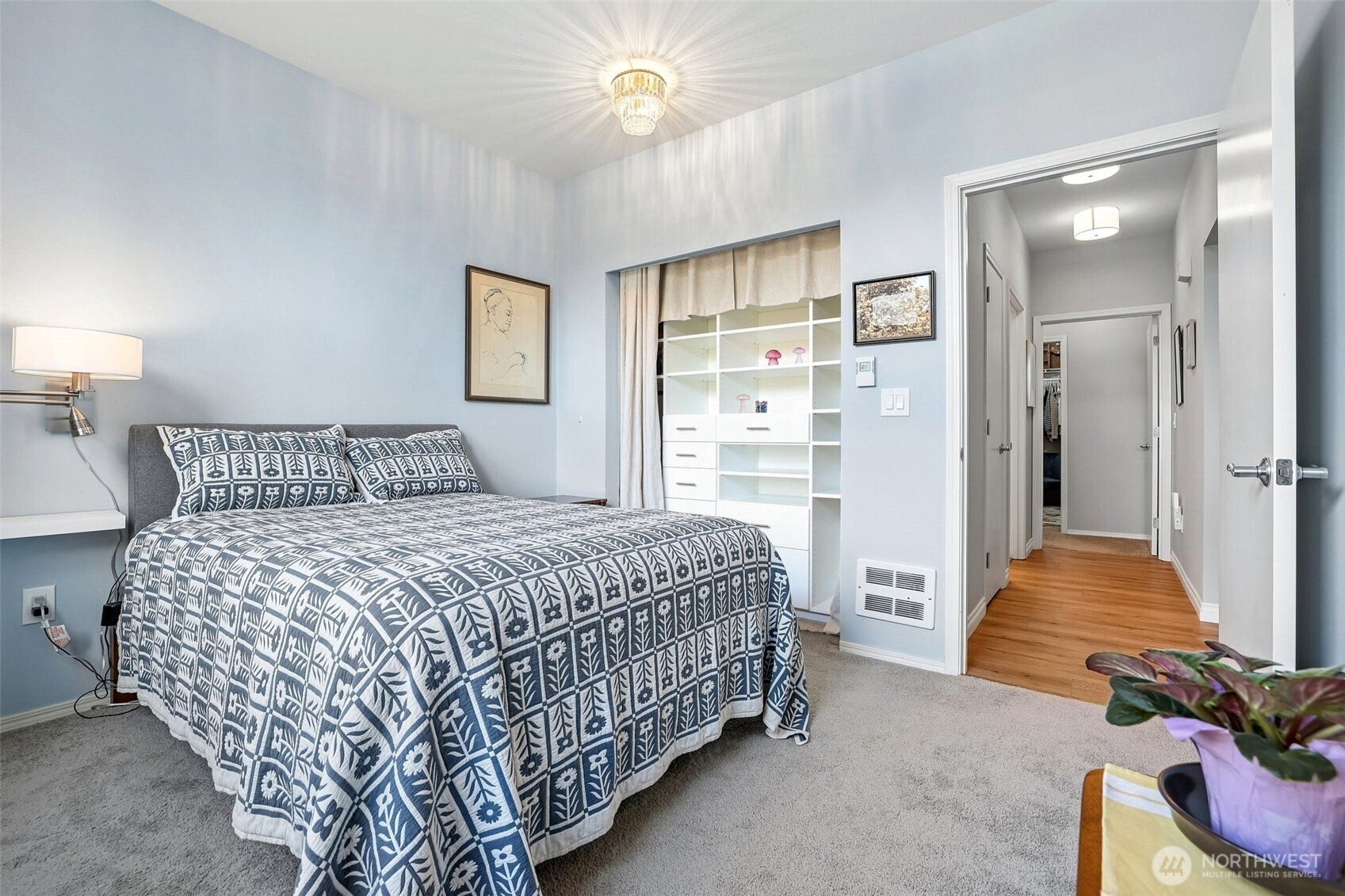 22475 SE 38th Terrace, #1418, Issaquah, WA 98029 Bedroom 1 has custom closet system that would enhance an office use space and clothes