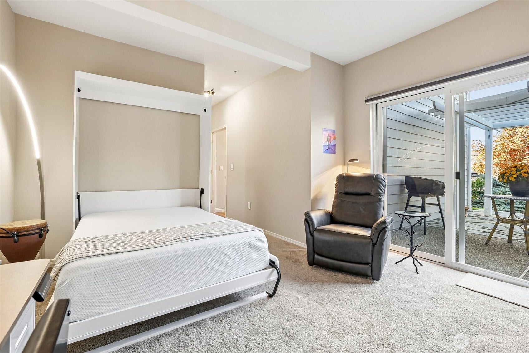 22475 SE 38th Terrace, #1418, Issaquah, WA 98029 Bedroom 2 has a murphy bed (optional) slider door to private patio.