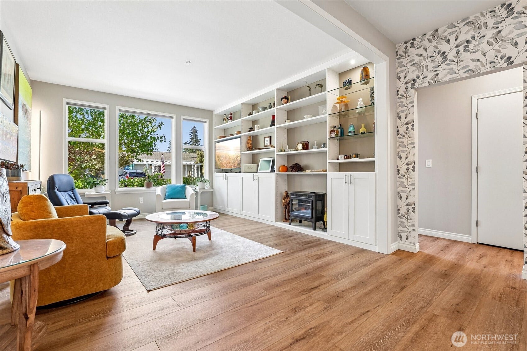 22475 SE 38th Terrace, #1418, Issaquah, WA 98029 Floor to ceiling custom cabinetry makes for a stunning focal point.