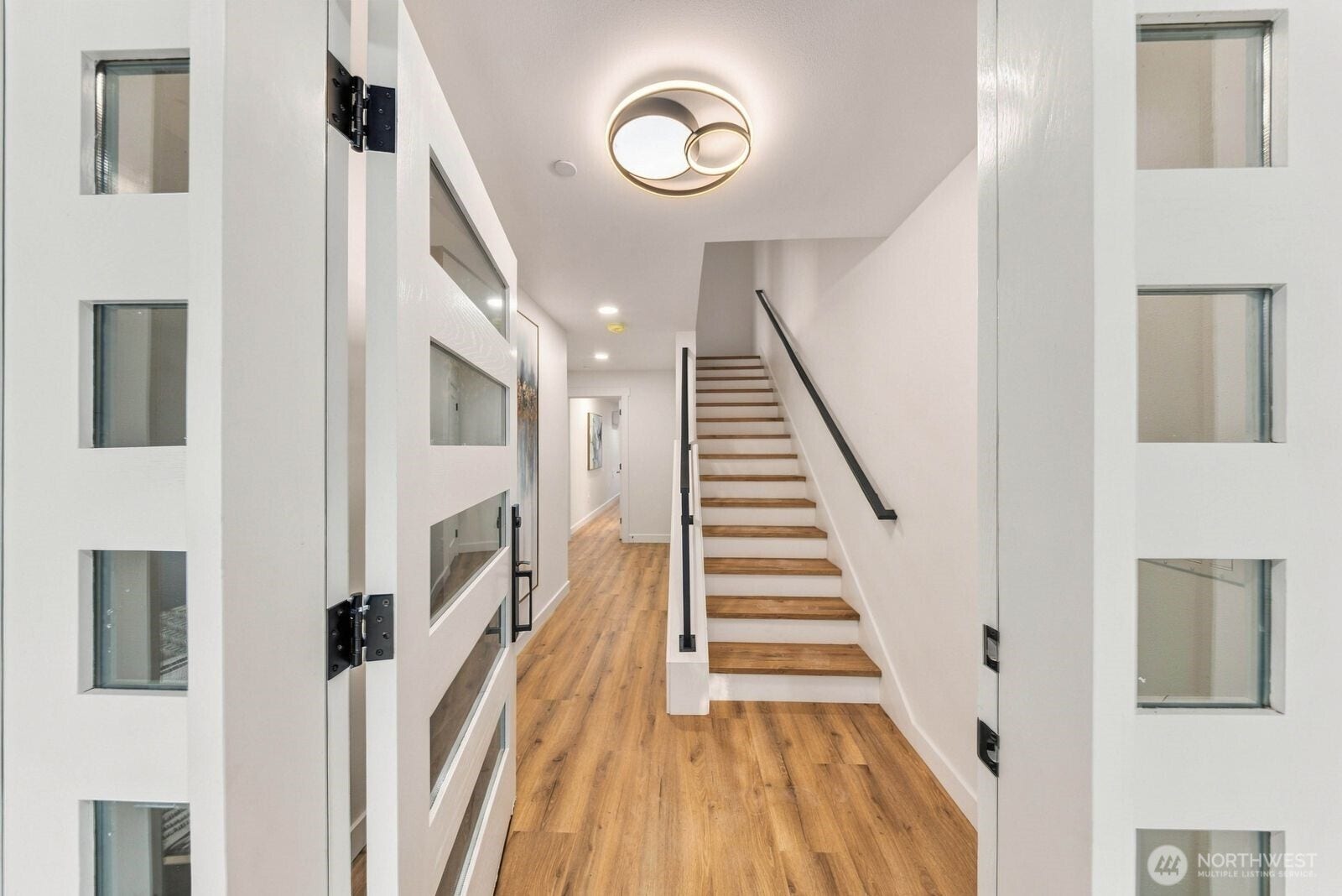 932 Duchess Road, #B-3, Bothell, WA 98012 Greeted by engineered hardwood floors.